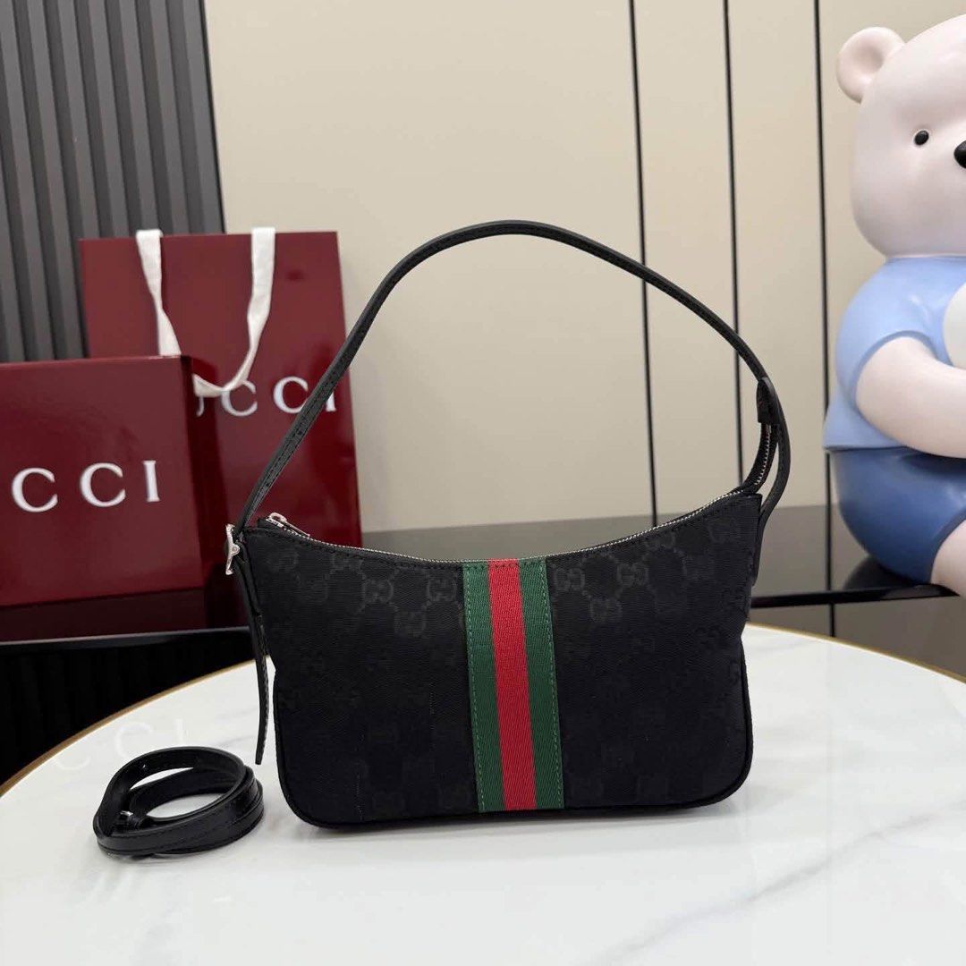 GG Mini Gossip Crossbody (Category: Cross-body Bags) located in Manila. Submitted by bagsandshoesmanymore (Listing ID 1464180512, Image 1). Description: GG Mini Gossip Crossbody Canvas leather What you see is what you get Please read before you order 👉🏻❗️Payment first before shipping ❗️Cut off time of payment 11am sameday delivery ❗️NO MEET UP / NO PICK UP ❗️ORDER CANNOT BE CANCELLED ❗️PLEASE DON’T BUY IF YOU ARE IN DOUBT ❗️NO RETURN! NO REFUND