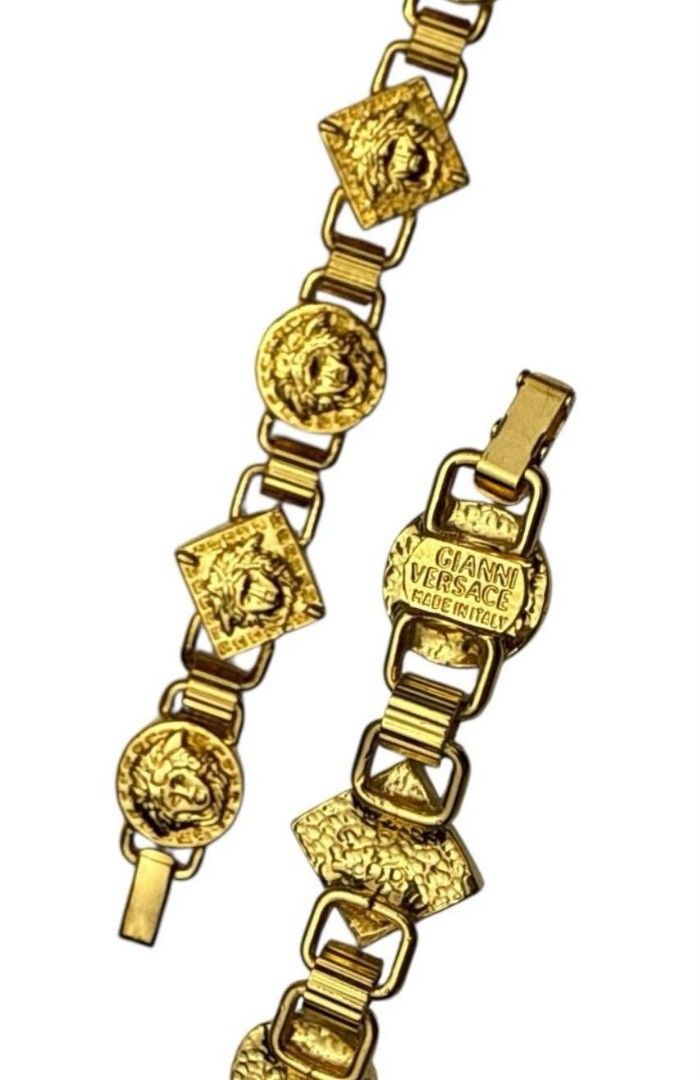 Gianni Versace bracelet (Category: Luxury Accessories) located in Paranaque City. Submitted by purple.aster_ (Listing ID 1464237950, Image 1). Description: Bold gold-tone Gianni Versace bracelet measuring 7.5”, featuring alternating Medusa medallions and textured links for a striking, opulent look. A statement vintage piece crafted in Italy that embodies iconic 90s Versace style..