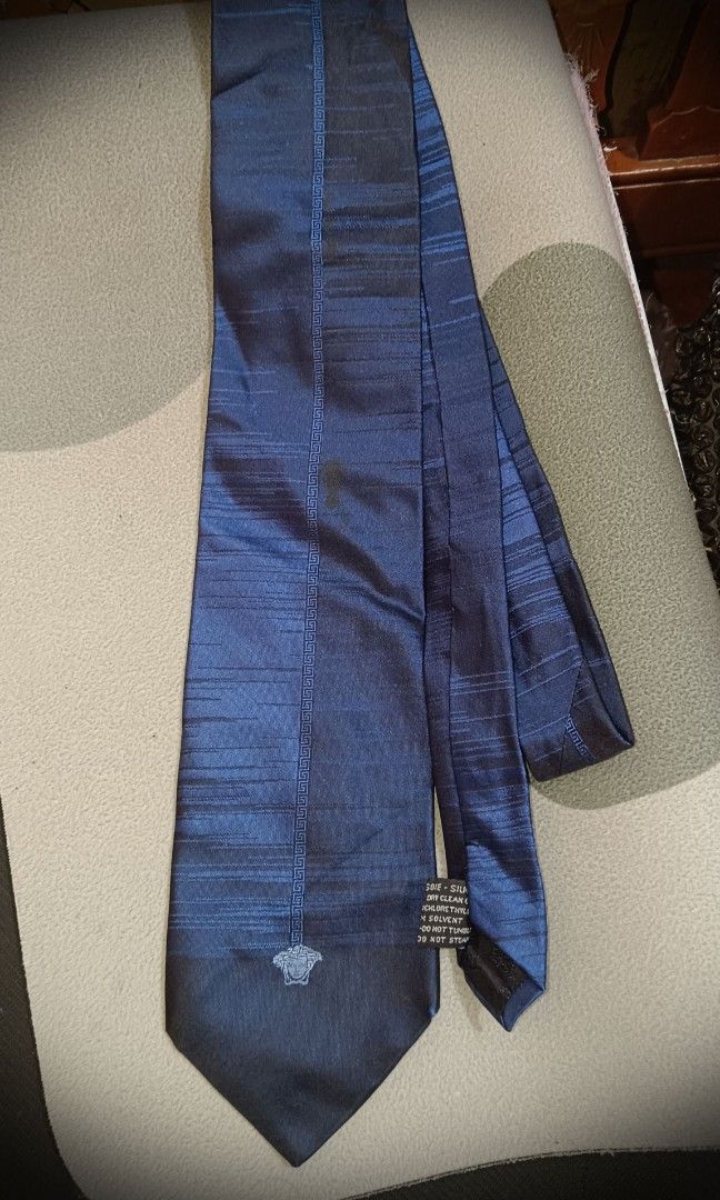 Vintage Gianni Versace Blue Medusa Pattern Silk Tie (Category: Ties) located in Manila. Submitted by liliaplay (Listing ID 1464176913, Image 1). Description: Authentic! Pre-loved i bought it from Japan but it's made from Italy Imported 100% Silk No Issue! Just need wash for that black looks like stain, No any dents/scratch Lowered to its negotiable price Payment 1st Shipped.