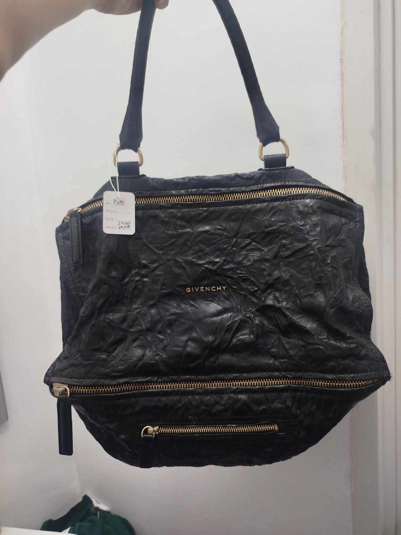 Givenchy Black Leather Wrinkled Tote Bag (Category: Tote Bags) located in Mandaluyong City. Submitted by tonsaribay58244 (Listing ID 1464276196, Image 1). Description: - Authentic Givenchy bag in black - Made from soft, wrinkled leather - Elegant gold zippers and hardware - Two comfortable top handles - Spacious interior, perfect for everyday use - entrupy certificate .