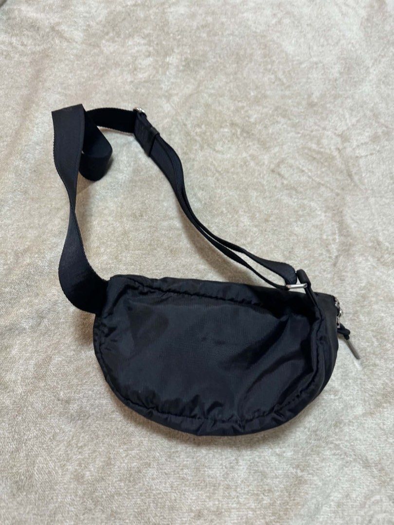 Givenchy Black Nylon Belt Bag Fanny Pack (Category: Belt bags, Clutches and Pouches) located in Makati City. Submitted by stallionmegx (Listing ID 1464292881, Image 2). Description: - Authentic Black Givenchy Belt Bag - Durable Nylon Material - Adjustable Strap with Buckle Closure - Secure Zippered Main Compartment - Perfect for Essentials - Versatile: Waist or Crossbody Wear.