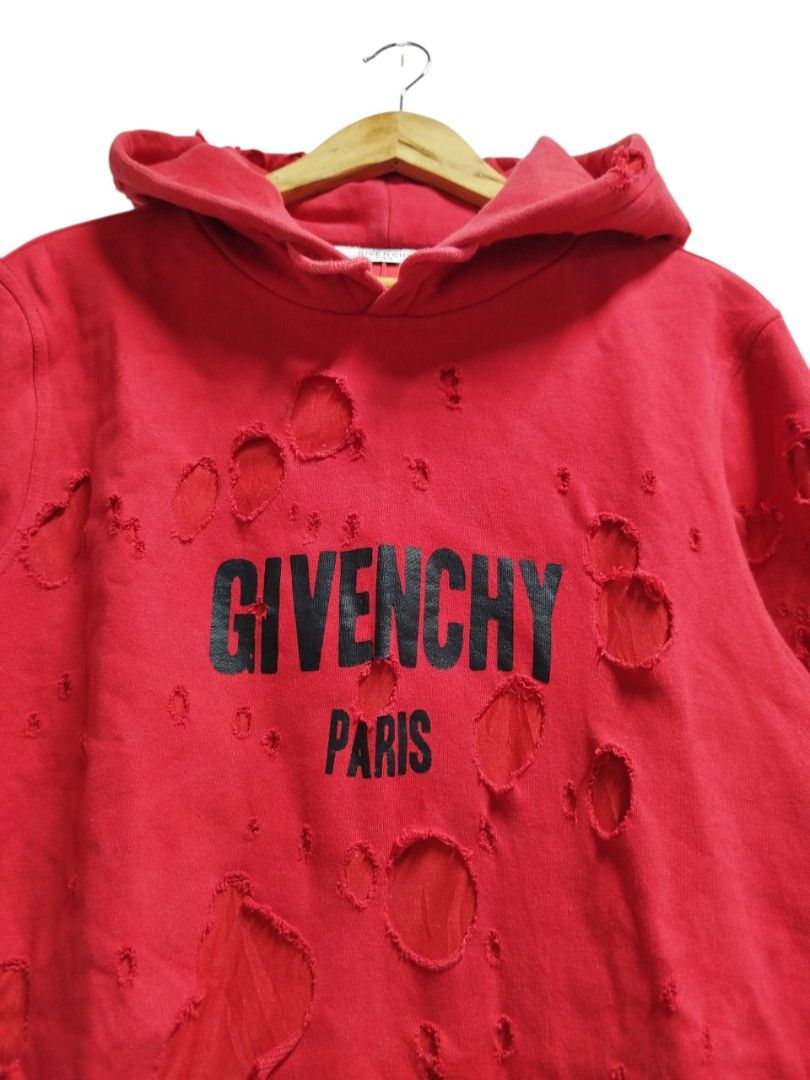 GIVENCHY DISTRESSED RED HOODIE JACKET (Category: Coats, Jackets and Outerwear) located in Bayombong. Submitted by Gentlemans_ClosEt (Listing ID 1464242086, Image 2). Description: GIVENCHY DISTRESSED RED HOODIE JACKET (authentic) SIZE XS ON TAG (unisex) CAN FIT UPTO SIZE MEDIUM (mens) LARGE (women's) DIMES: W19.5 X L29 9/10 COLOR RATE EXCELLENT CONDITION NO ISSUE.
