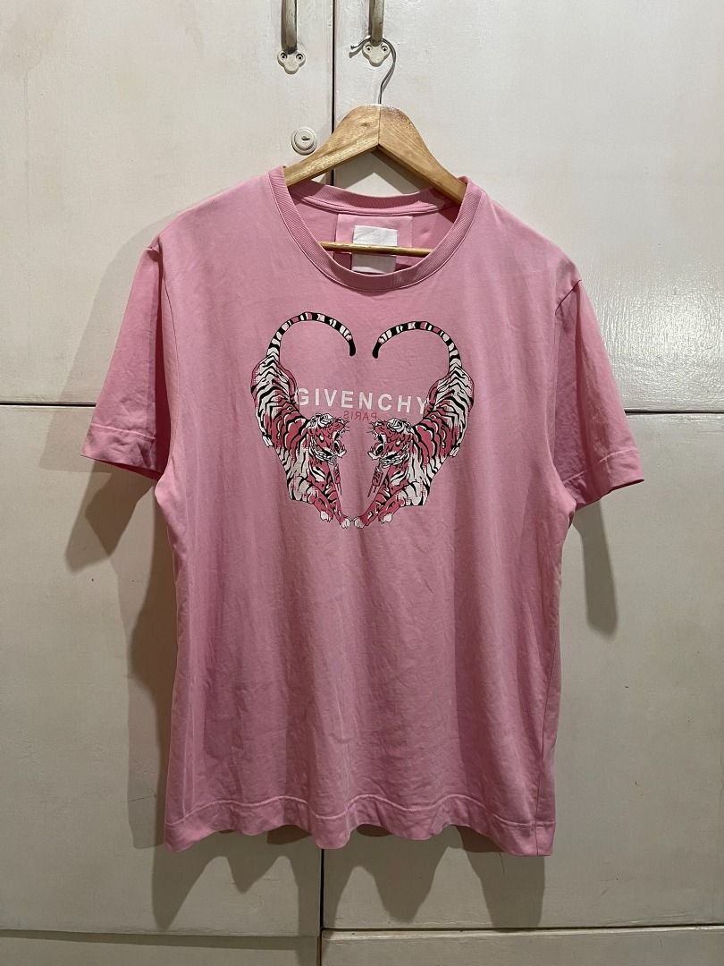 GIVENCHY 'HEART PINK TIGER' SHIRT (Category: Formal Shirts) located in Manila. Submitted by ako.si.lemmor (Listing ID 1464286882, Image 1). Description: This item is thrifted, manage your expectation. Dimes: 22.5X27 (L-XL) Color rate: 8.5/10 Issue: Slight print fade Ship at your own cost or pickup Mandaluyong..