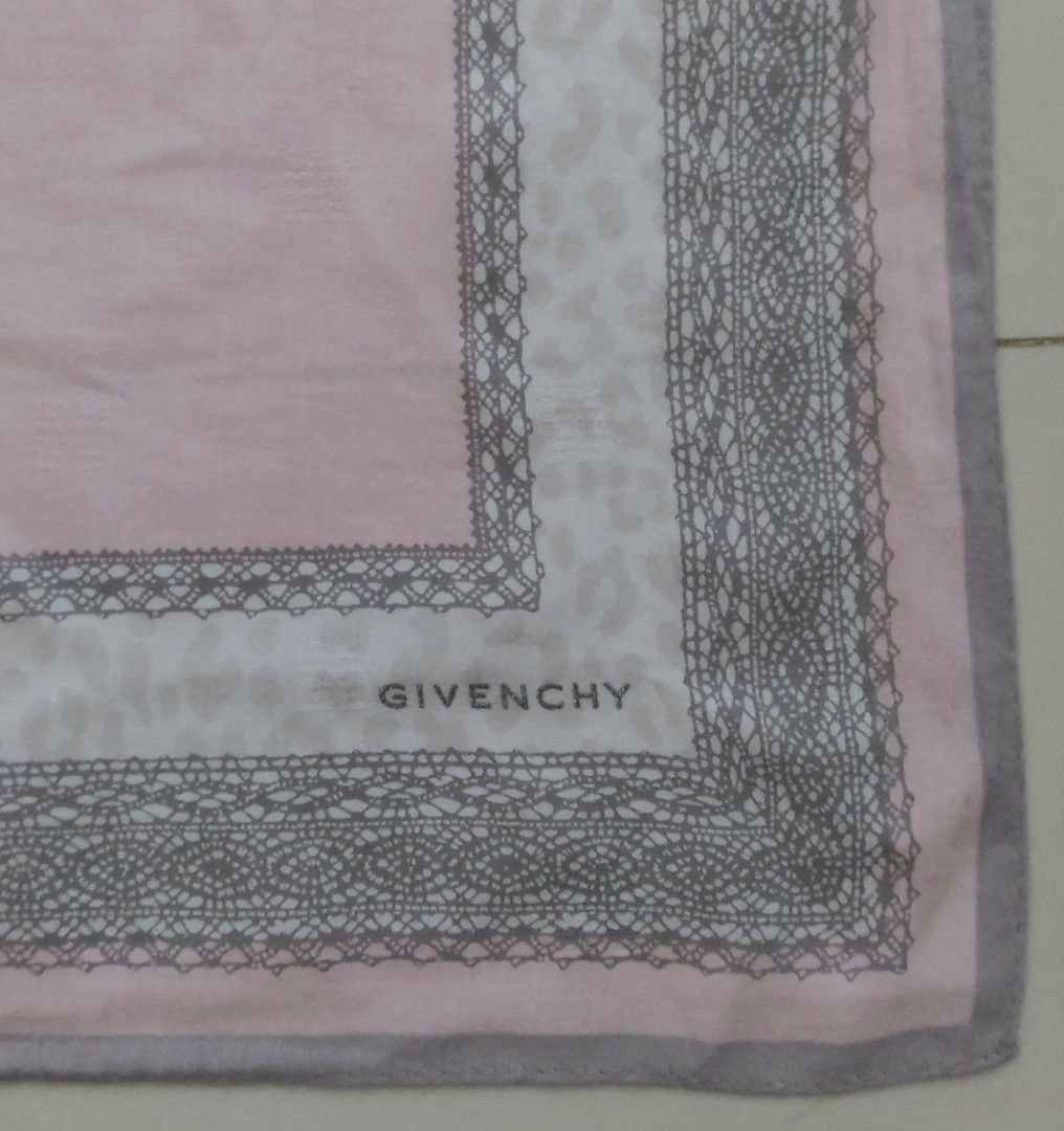 Givenchy Pink handkerchief (Category: Scarves) located in Lapu Lapu. Submitted by agnesapm_29813 (Listing ID 1464260599, Image 1). Description: - Authentic Givenchy handkerchief - Soft pink center - Delicate lace and leopard print border - Approximate dimensions: 19x19 inches - Washed and ironed already .