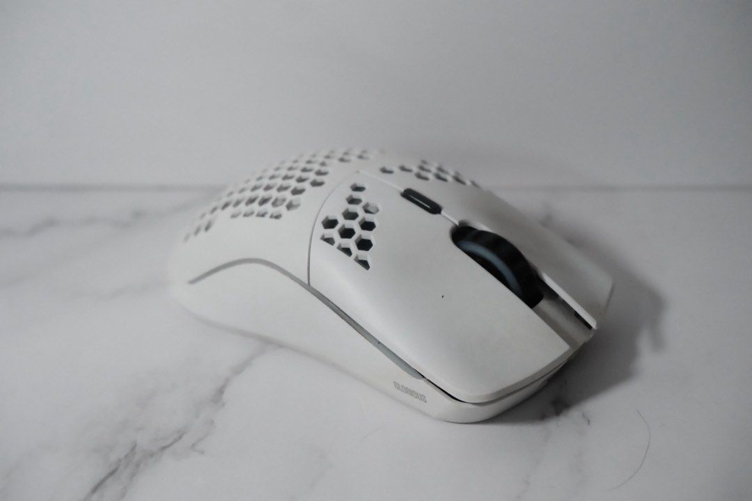 Glorious Model O Wireless Gaming Mouse White (Category: Mouse & Mousepads) located in Pasig City. Submitted by allthingsgreat.ph (Listing ID 1464322188, Image 3). Description: - White Glorious Model O wireless gaming mouse - Ultra-lightweight honeycomb shell design - Smooth glide feet for effortless movement - Includes USB receiver - Perfect for gaming and daily use - Tested and confirmed working well.