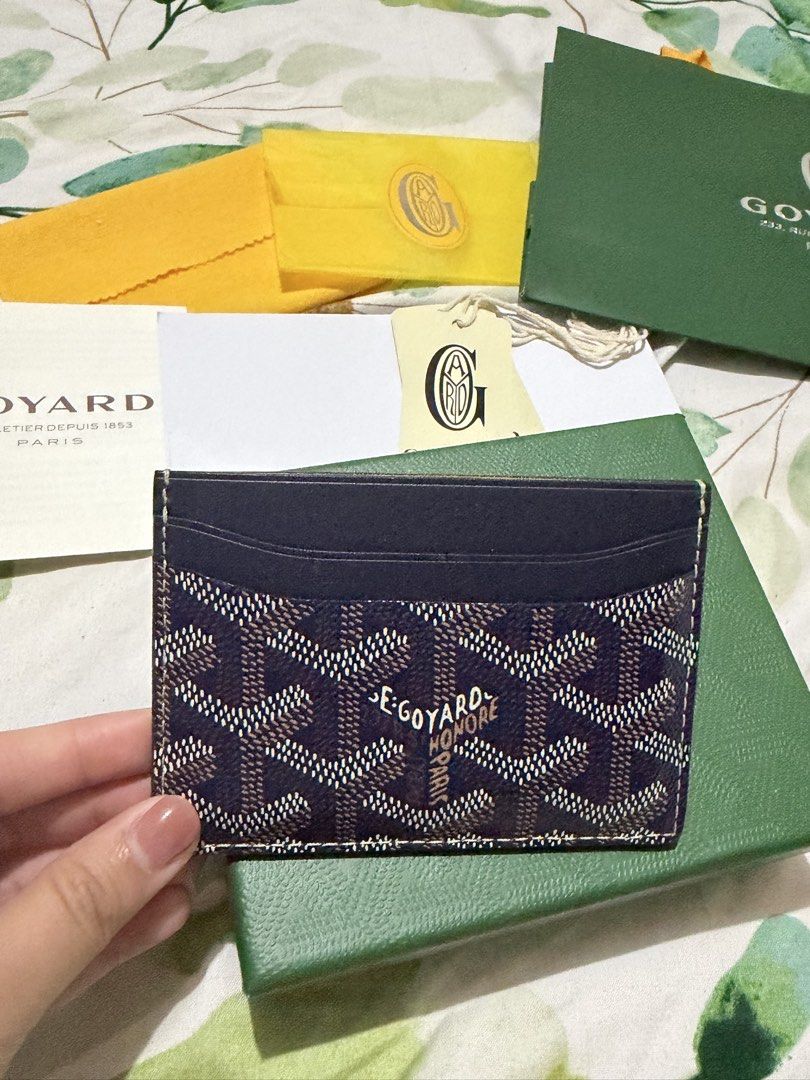 Goyard Sulpice Card Holder - Navy Blue (Category: Luxury Bags & Wallets) located in Manila. Submitted by thebaddestcloset (Listing ID 1464291712, Image 2). Description: Goyard Sulpice Card Holder — Navy Blue Selling a Goyard card holder in excellent, like-new condition. ✨ * Classic Goyardine canvas * Navy/black colorway * Minimalist and timeless design * Comes with box, dust/packaging materials, tags, and booklet as shown in photos * Kept careful