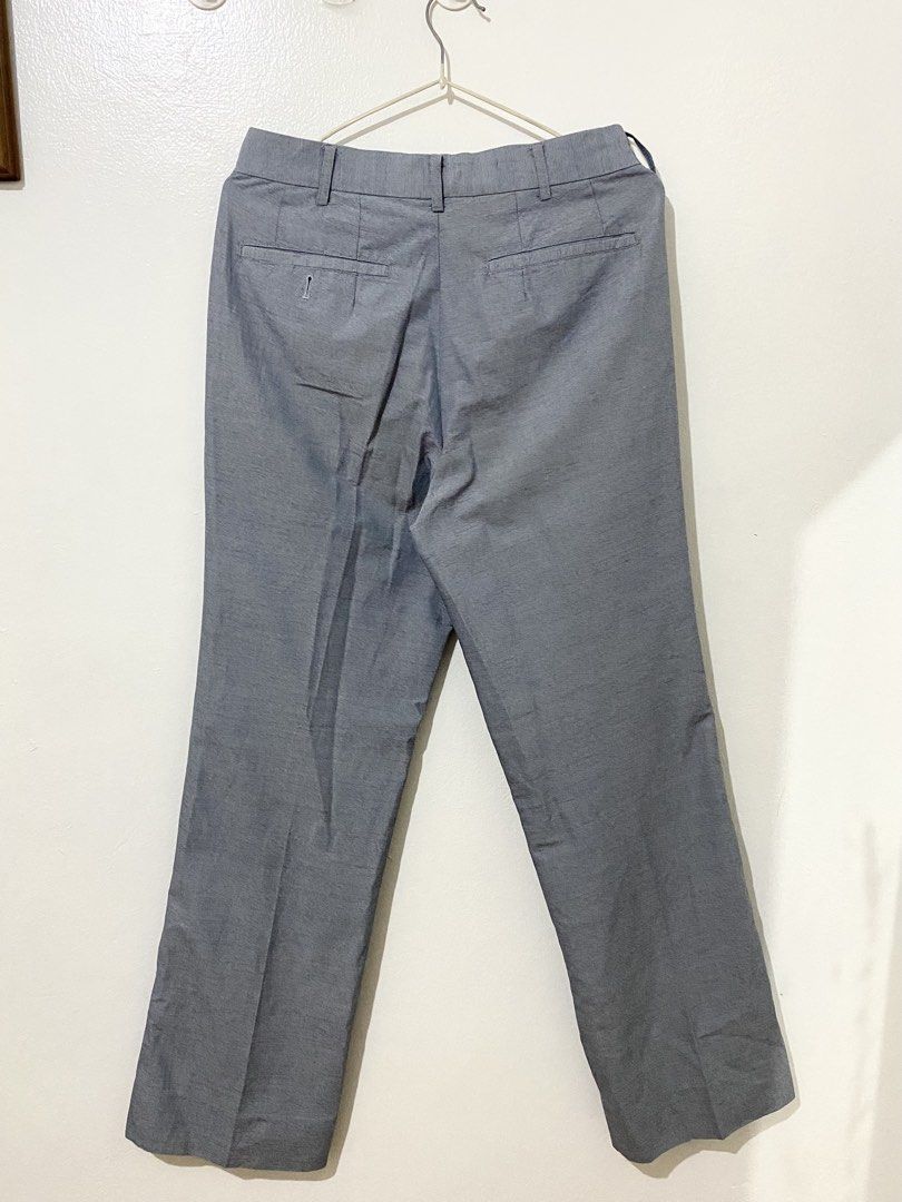 Gray Textured Trouser Pants (Category: Trousers) located in Caloocan City. Submitted by ashpreloves (Listing ID 1464198831, Image 3). Description: - Size 39 Length 40 - Straight-leg fit - Belt loops - Button and zip closure - Ideal for work or formal occasions - Easy to style with shirts or blazers.