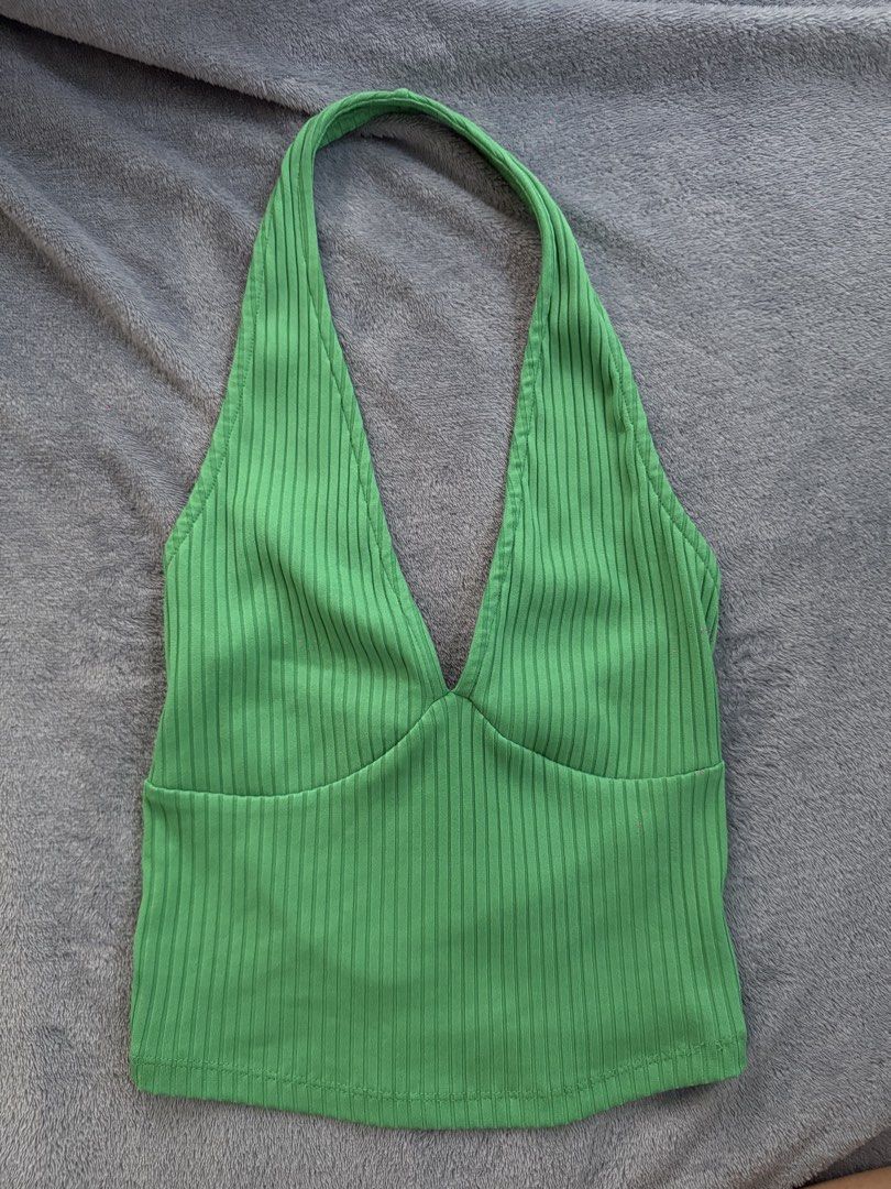 Green Ribbed Halter Neck Crop Top (Category: Sleeveless) located in Manila. Submitted by razshen_29 (Listing ID 1464157696, Image 1). Description: - Cute green halter neck crop top - Ribbed material for a comfy fit - Deep V-neck design - Versatile: great for casual outings or dressing up - Easy to pair with jeans or skirts - Can be worn on its own or layered.