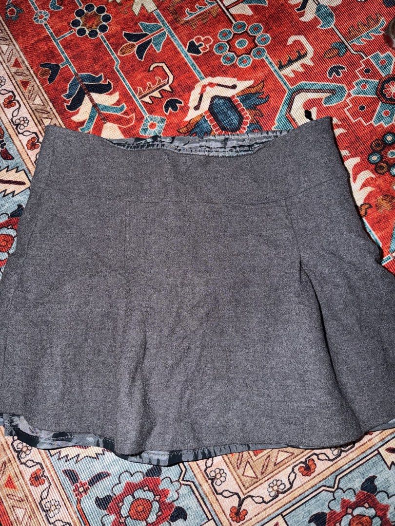 Grey Pleated Mini Skirt (Category: Skirts) located in Manila. Submitted by hihiyana (Listing ID 1464296421, Image 2). Description: - Grey pleated mini skirt - Comfortable elastic waistband - Perfect for casual outfits or dressing up - Easy to style with various tops and shoes.