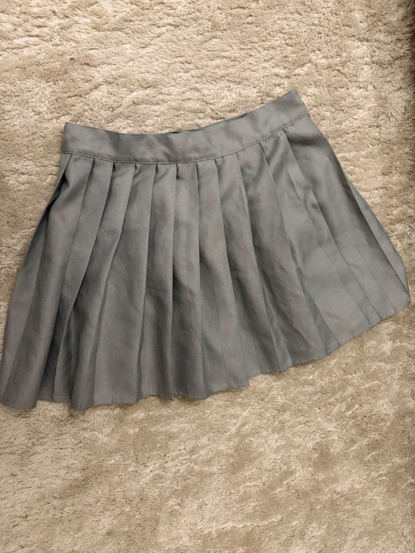 Grey Pleated Mini Skirt (Category: Skirts) located in Caloocan City. Submitted by croissant8765 (Listing ID 1464314027, Image 1). Description: - Grey pleated mini skirt - School uniform style - Very cute and versatile - Can be dressed up or down - Great for everyday wear or costumes - Easy to style with different tops.