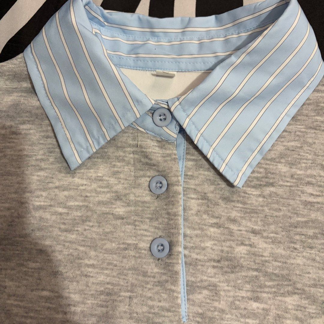Grey Sweatshirt with Blue Striped Collar (Category: Coats, Jackets and Outerwear) located in San Juan City. Submitted by nadzbautista (Listing ID 1464163576, Image 2). Description: - Grey sweatshirt - Light blue and white striped collar - Button-up placket at the neck - Long sleeves with ribbed cuffs Loc: San Juan City 📍 Mop: BPI, Maribank, GCash Mod: J&T, Lalamove.