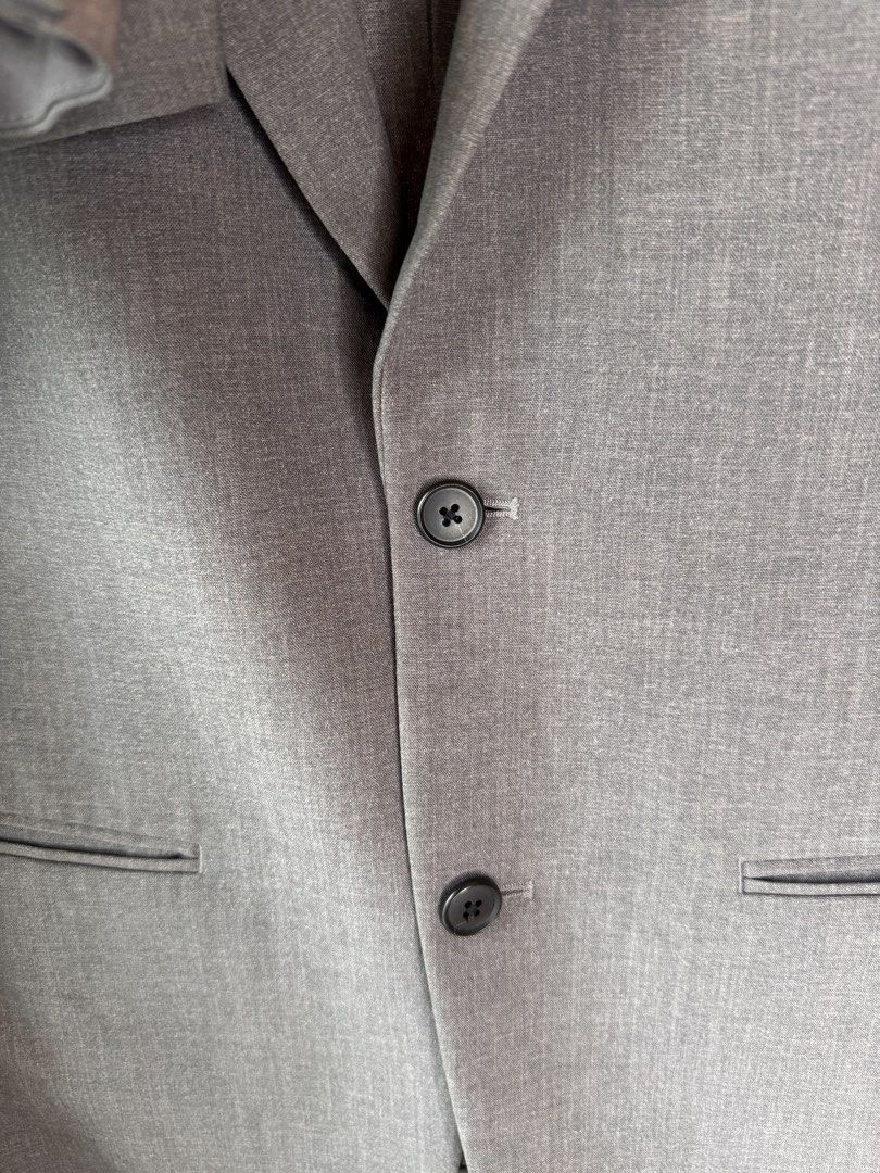 Grey Two-Piece Suit Jacket and Trousers (Category: Sets & Coordinates) located in Mandaluyong City. Submitted by cartmyitems (Listing ID 1464223290, Image 3). Description: - Classic grey suit set: includes jacket and matching trouser Sold separately Blazer- 700 Trouser- 300 (with minor issue) please check the photo.