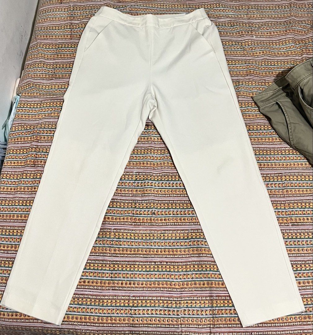 GU Cream Straight Leg Pants/ Trouser (Category: Jeans) located in Caloocan City. Submitted by mmc1999 (Listing ID 1464281544, Image 1). Description: - Cream colored straight leg pants from GU - Comfortable elastic waistband - Two convenient side pockets - Made from a durable polyester and polyurethane blend - Versatile for casual outings or dressing up.