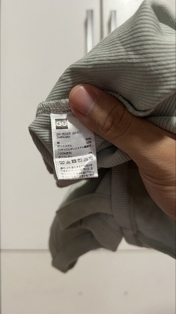 GU sleeveless (Category: Sleeveless) located in Makati City. Submitted by badethskie (Listing ID 1464186210, Image 2). Description: No issues/flaws.