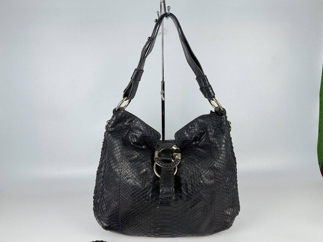 Gucci - Tom Ford - Python Shoulder Bag - 2000’s Gucci Tom Ford Era (Category: Luxury Bags & Wallets) located in Cabanatuan. Submitted by Cruel.Thrift.PH (Listing ID 1464263154, Image 2). Description: 2000’s Gucci Tom Ford Era Python Shoulder Bag Authenticity Guaranteed Condition : 9/10 Price : 45,500 + Shipping Fee.