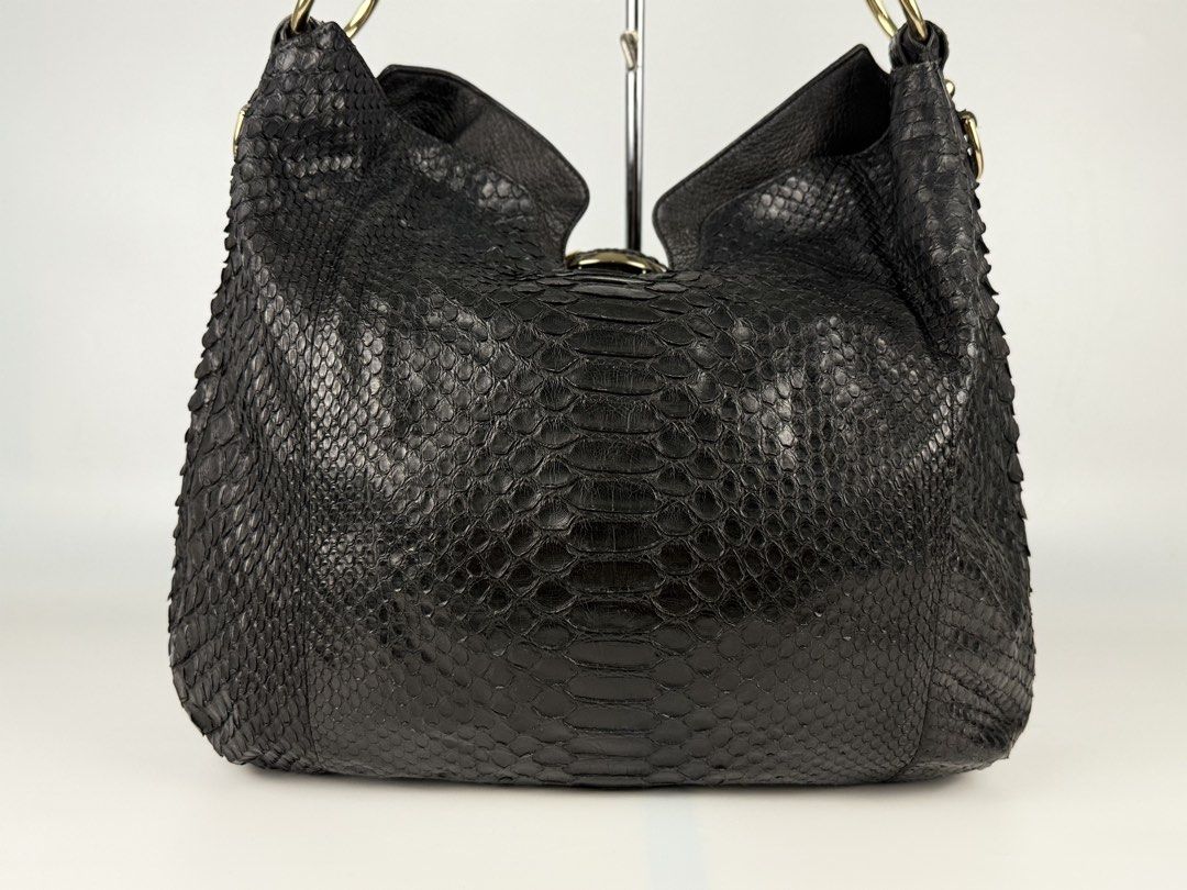 Gucci - Tom Ford - Python Shoulder Bag - 2000’s Gucci Tom Ford Era (Category: Luxury Bags & Wallets) located in Cabanatuan. Submitted by Cruel.Thrift.PH (Listing ID 1464263154, Image 3). Description: 2000’s Gucci Tom Ford Era Python Shoulder Bag Authenticity Guaranteed Condition : 9/10 Price : 45,500 + Shipping Fee.