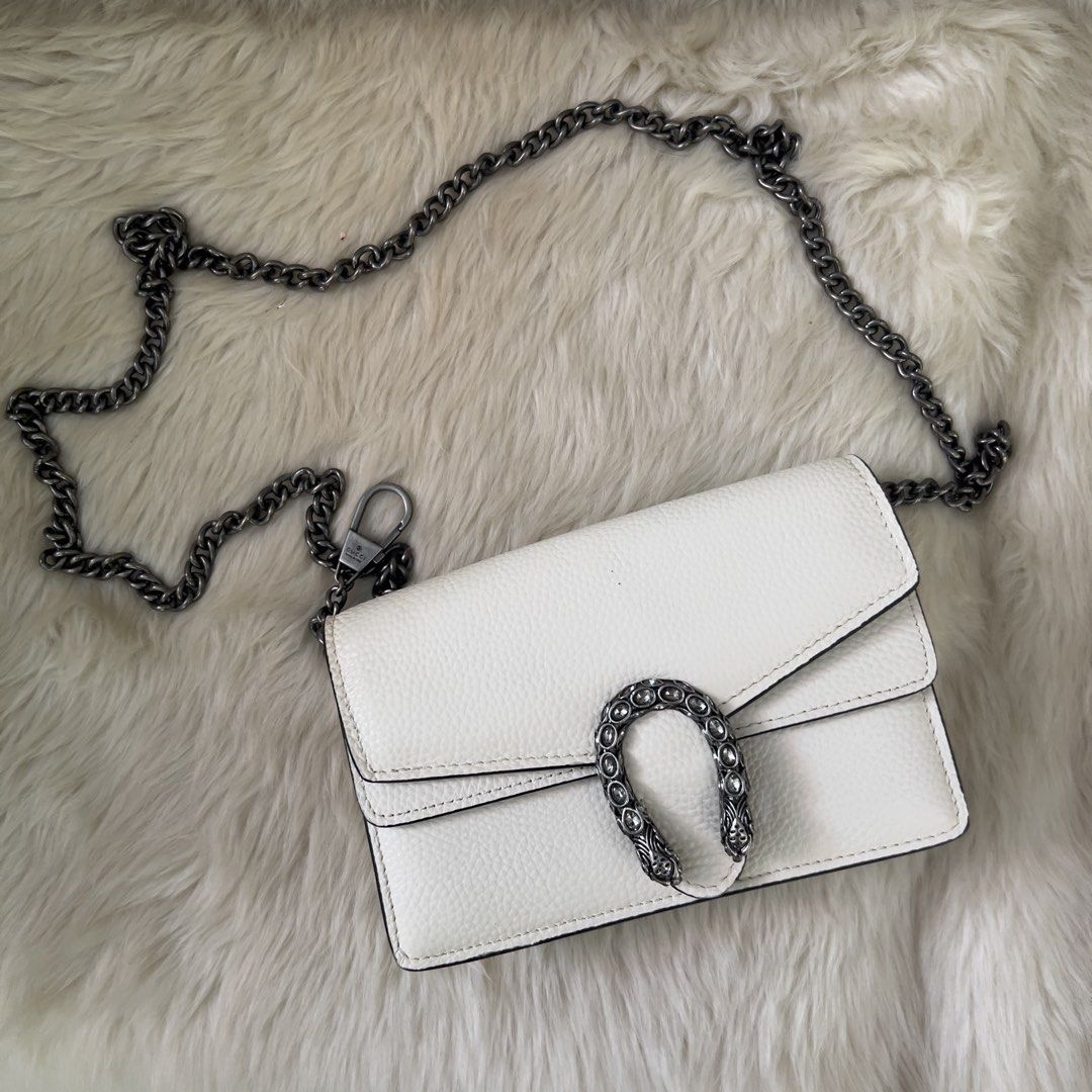 Gucci Dionysus White Leather Shoulder Bag (Category: Luxury Bags & Wallets) located in Mandaue City. Submitted by heeba_inu2 (Listing ID 1464169985, Image 1). Description: - NGA - flaws in slide 4 (faint line) and slide 5 (rubber lining in side of bag) Price can be negotiated! Please feel free to DM for more info 💕.