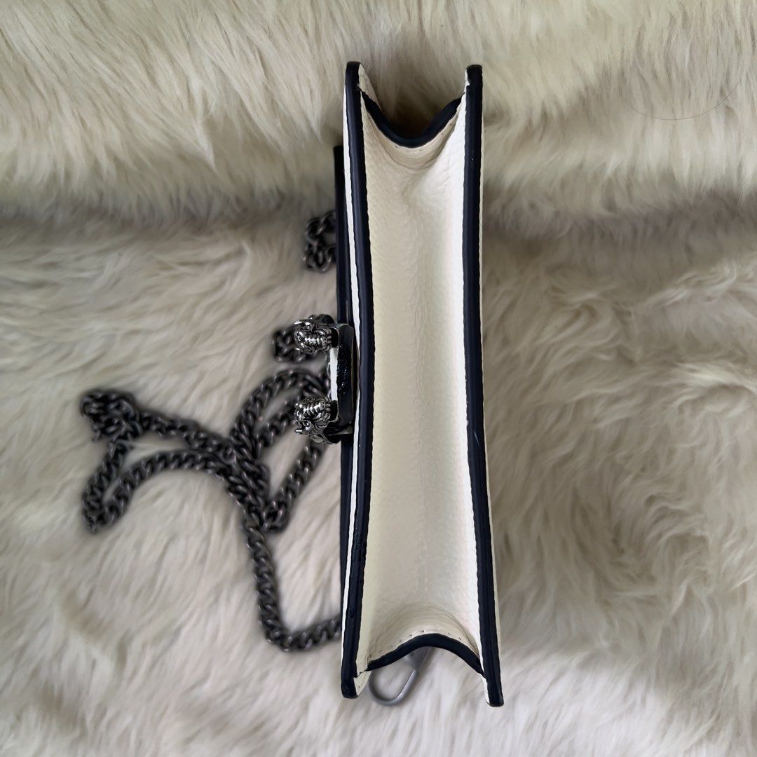 Gucci Dionysus White Leather Shoulder Bag (Category: Luxury Bags & Wallets) located in Mandaue City. Submitted by heeba_inu2 (Listing ID 1464169985, Image 3). Description: - NGA - flaws in slide 4 (faint line) and slide 5 (rubber lining in side of bag) Price can be negotiated! Please feel free to DM for more info 💕.
