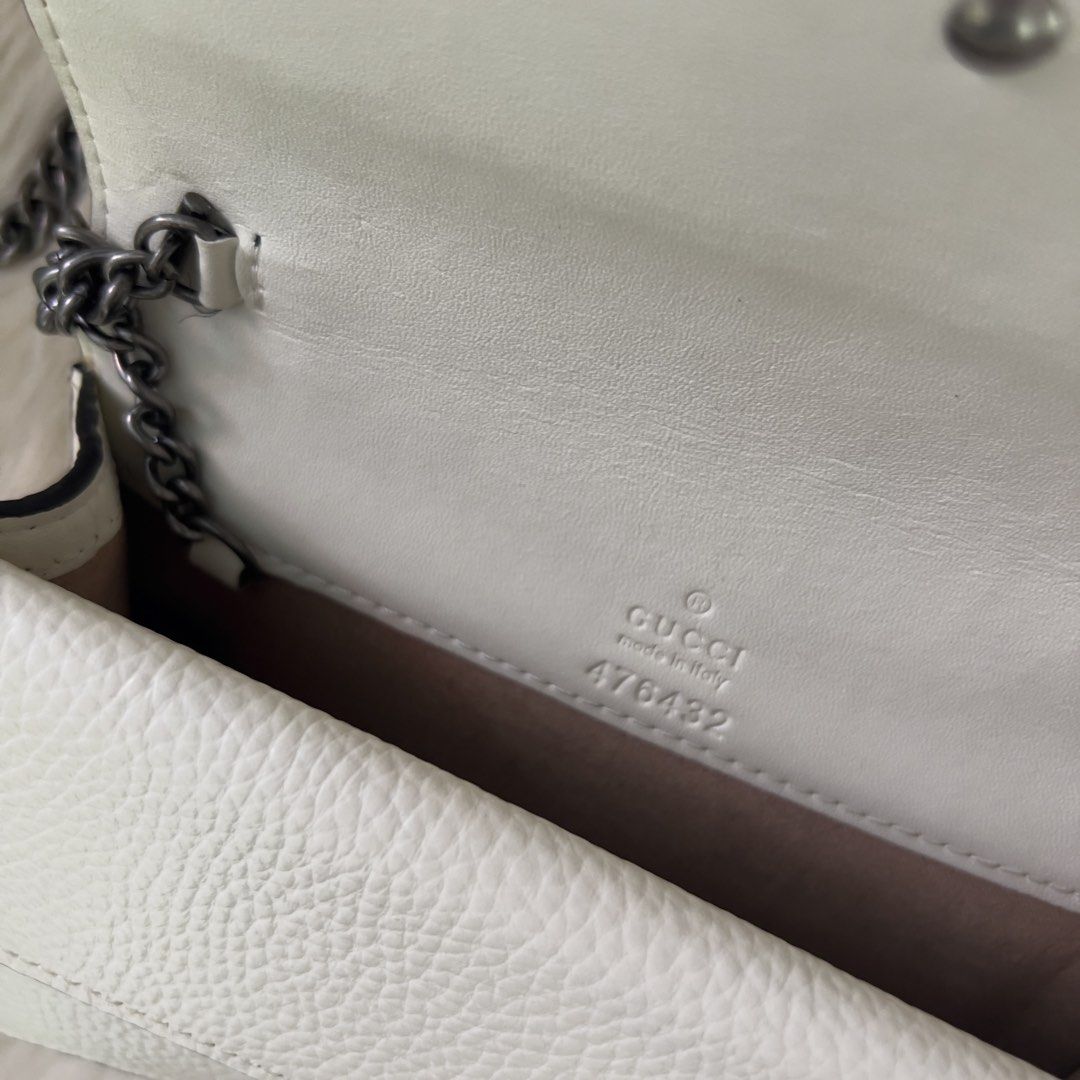 Gucci Dionysus White Leather Shoulder Bag (Category: Luxury Bags & Wallets) located in Mandaue City. Submitted by heeba_inu2 (Listing ID 1464169985, Image 2). Description: - NGA - flaws in slide 4 (faint line) and slide 5 (rubber lining in side of bag) Price can be negotiated! Please feel free to DM for more info 💕.