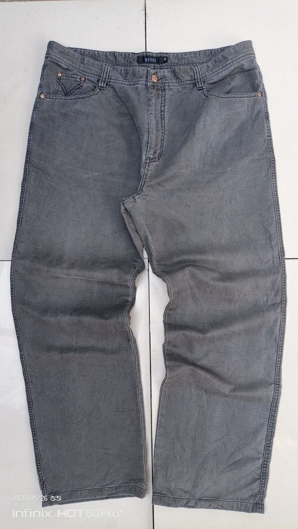 Gucci Grey Denim Jeans (Category: Chinos) located in Manila. Submitted by treblig. (Listing ID 1464214651, Image 1). Description: - Genuine Gucci grey denim jeans - Classic five-pocket design - Features iconic Gucci logo on back pockets - Made in Italy - Ideal for casual wear.