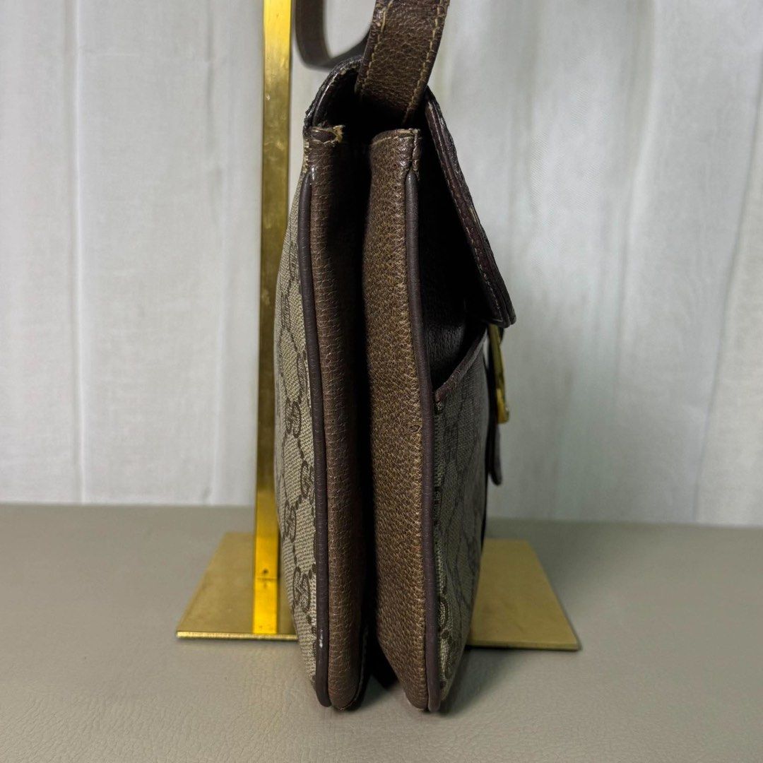 Gucci Monogram Shoulder Bag (Category: Luxury Bags & Wallets) located in Madrid. Submitted by jhunaceee (Listing ID 1464295749, Image 3). Description: - Classic Gucci shoulder bag - Iconic GG monogram canvas - Brown leather trim and strap - Gold-tone buckle closure - Great everyday bag.