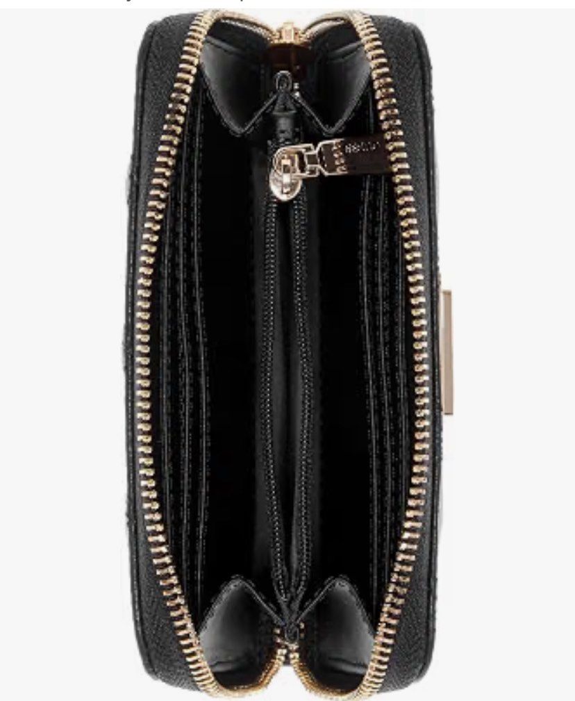 Guess Quilted Zip Around Wallet Black (Category: Wallets & Card holders) located in Manila. Submitted by apraeltrends (Listing ID 1464209644, Image 3). Description: - Stylish black Guess wallet - Elegant quilted chevron pattern - Secure zip-around closure - Multiple interior card slots - Convenient zippered coin pocket - Chic gold-tone hardware - Compact size: approximately 4.5" x 3.5".