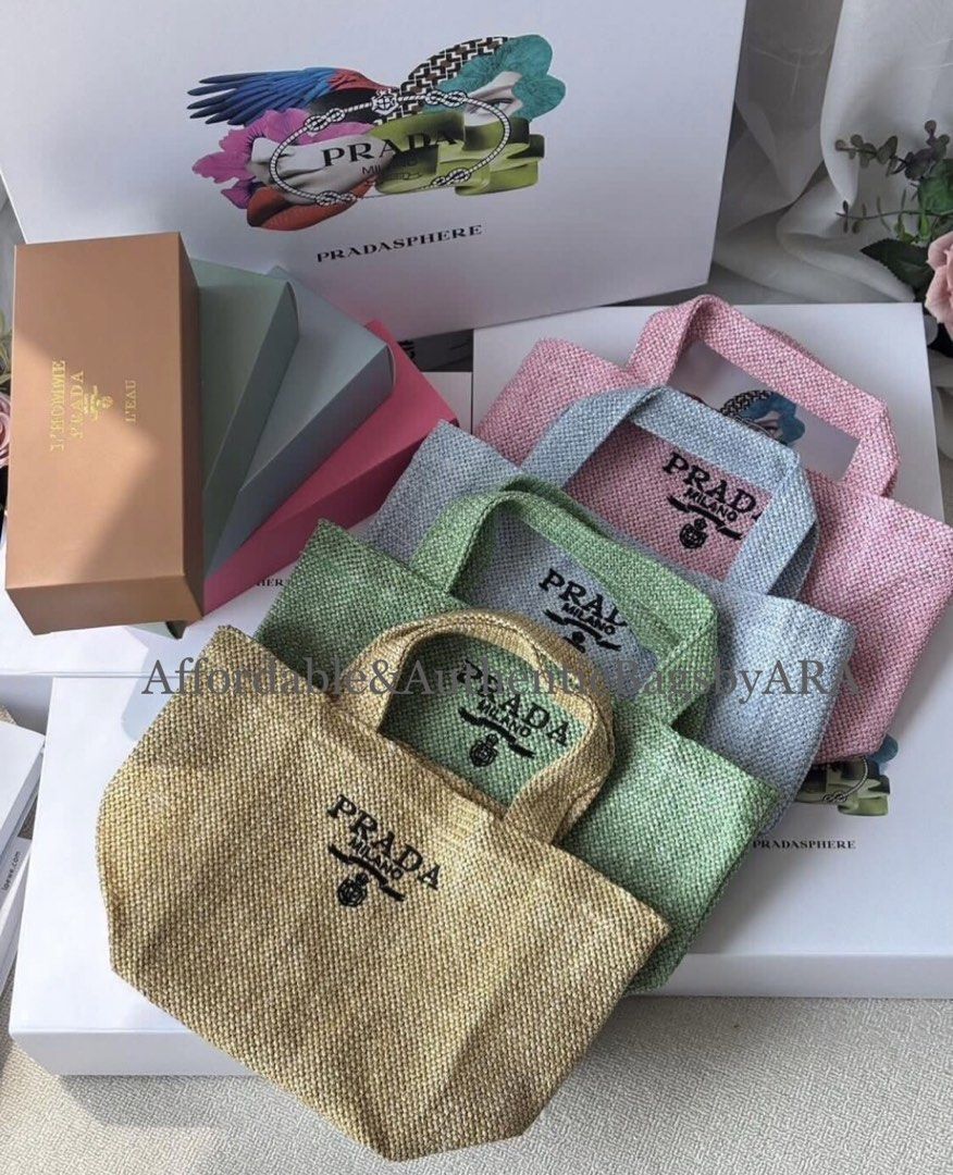 GWP PRADA WOVEN LUNCH BAG/HANDBAG (Category: Tote Bags) located in Daet. Submitted by ecassenluxuries (Listing ID 1464232808, Image 1). Description: 📌 FIXED PRICE ALREADY ✅ All items are guaranteed 💯% AUTHENTIC GWP ITEM ▫️Cute Prada woven tote bags ▫️Available colors: Gold, Pink, Light Blue, Green ▫️Ideal for everyday use or as a beach bag ▫️Small and compact size ▫️Includes box ✅ Onhand 🪧STRICTLY PAYMENT FIRST 🪄MOP (Mode of Payment ) : GCash