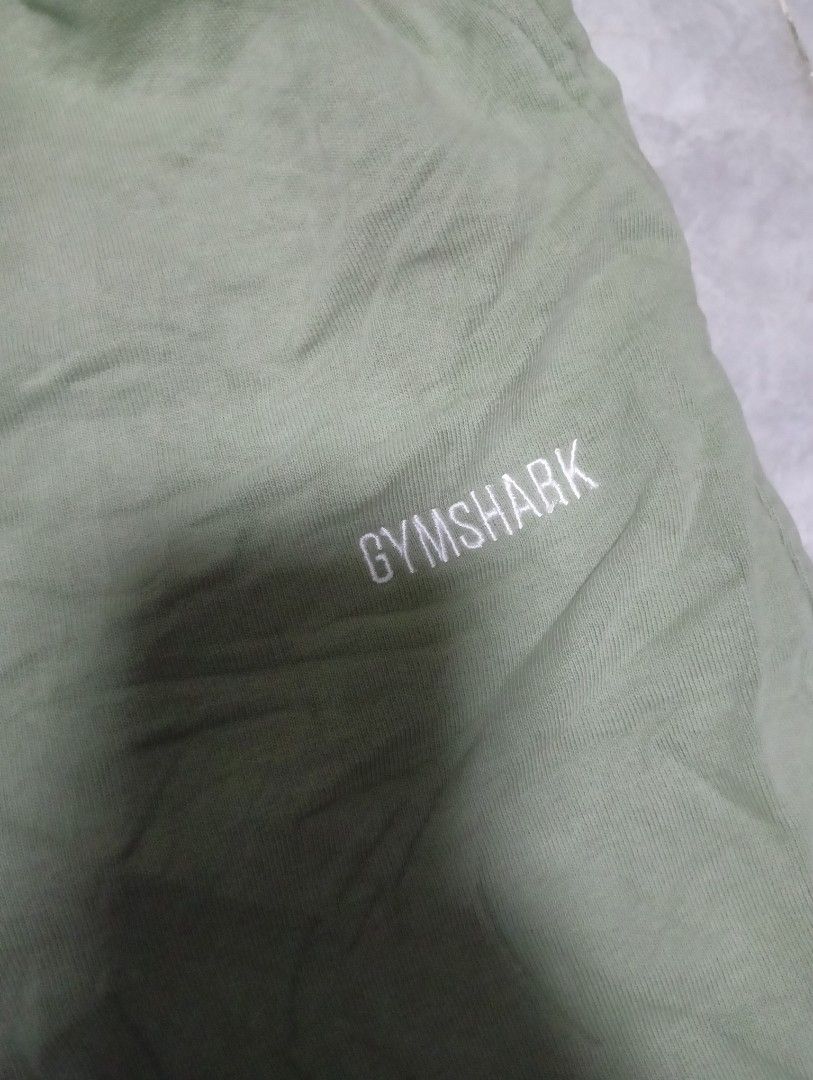 gymshark Sweatpants with Drawstring (Category: Joggers) located in Odiongan. Submitted by thrifthub_bundang07 (Listing ID 1464261190, Image 3). Description: -Gymshark sweatpants size large Comfortable sage green sweatpants - Elastic waistband with white drawstring - Cuffed ankles for a snug fit - Small logo detail on the left thigh - Ideal for lounging or casual wear.