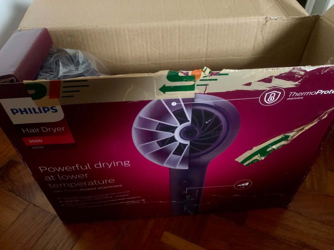 Hair Dryer (Category: Hair) located in Dasmarinas. Submitted by pepperronnie (Listing ID 1464180065, Image 2). Description: This is a Philips 3000 Series Hair Dryer 🖌️💨 Quick details: - Model line: Philips 3000 Series with ThermoProtect technology — it dries hair powerfully but at a lower, gentler temperature so your hair doesn’t get damaged by excessive heat. ​ - What’s included: Main hairdryer unit + 2 attachments: ✅ Concentrator nozzle — for