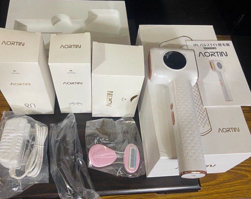 Hair Remover Device with Accessories (Category: Hair Removal) located in Manila. Submitted by cdb_22 (Listing ID 1464302661, Image 2). Description: - AORTIN IPL Hair Remover - Complete set with main device, power adapter, and all accessories shown - Original packaging (box) included - Ideal for convenient at-home hair removal.