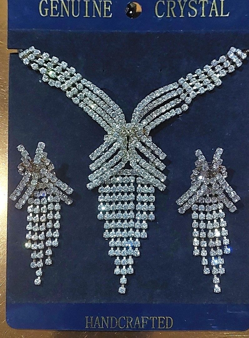 Handcrafted Genuine Crystal Necklace & Earrings Set (Category: Other Accessories) located in Makati City. Submitted by geesharma_08 (Listing ID 1464179044, Image 1). Description: A BER szn must-have! Turn heads and catch eyes with this high-quality geniune crystal waterfall necklace and matching fringe earrings set. Crafted with brilliant, light-catching crystals arranged in a dramatic, fluid silhouette, this set delivers unmatched old-Hollywood 