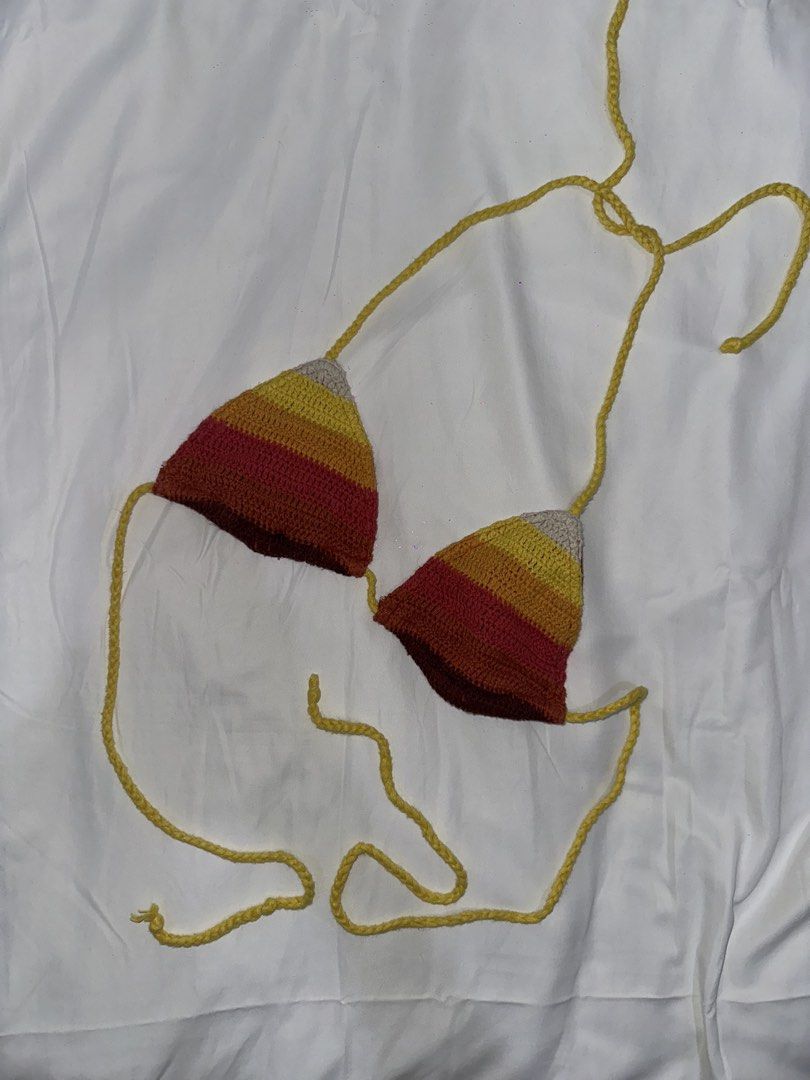 Handmade Crochet Striped Bikini Top (Category: Bikinis & Swimsuits) located in Cainta. Submitted by buy.preloved (Listing ID 1464249514, Image 1). Description: - Unique handmade crochet bikini top - Features a chic stripe pattern - Yellow ties for adjustable sizing (fits S/M) - Ideal for beach days, festivals, or summer events - A one-of-a-kind addition to your swimwear collection.