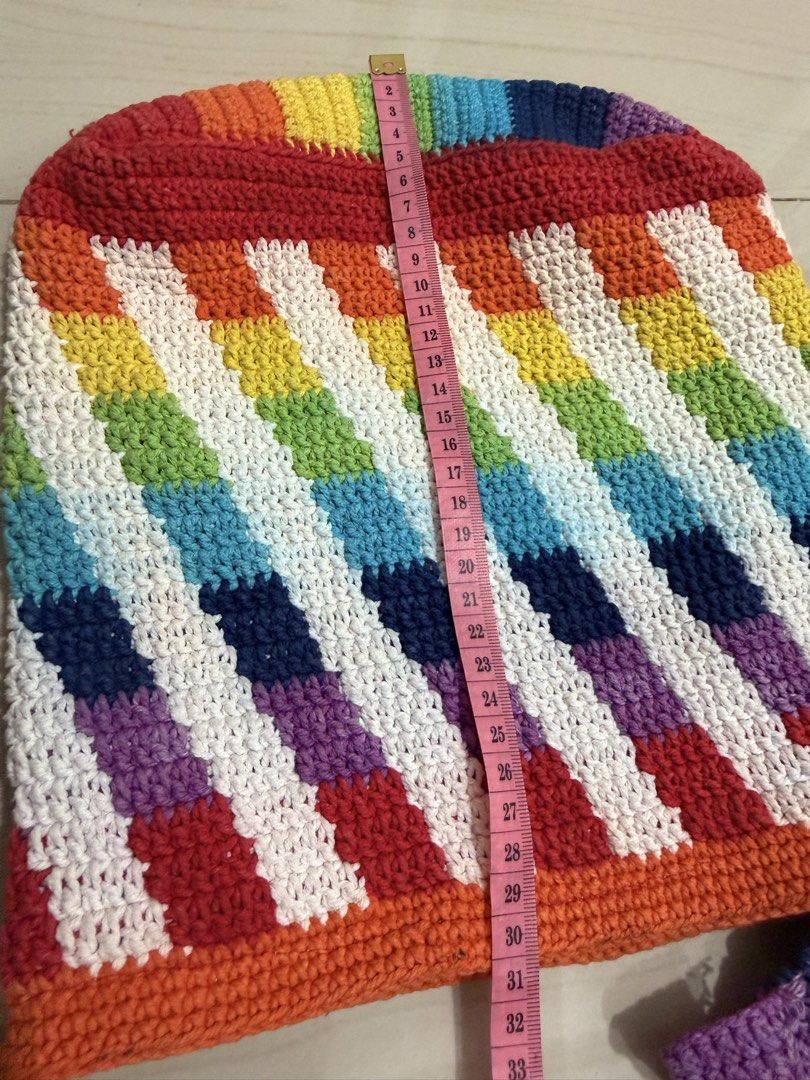 Handmade Rainbow Crocheted Shoulder Bag (Category: Shoulder Bags) located in Makati City. Submitted by petite_preloved2 (Listing ID 1464354441, Image 3). Description: - Super cute handmade crocheted shoulder bag - Vibrant rainbow stripe pattern - Crocheted rainbow strap - Approx. 13" wide x 15" tall - Unique and colorful statement piece.