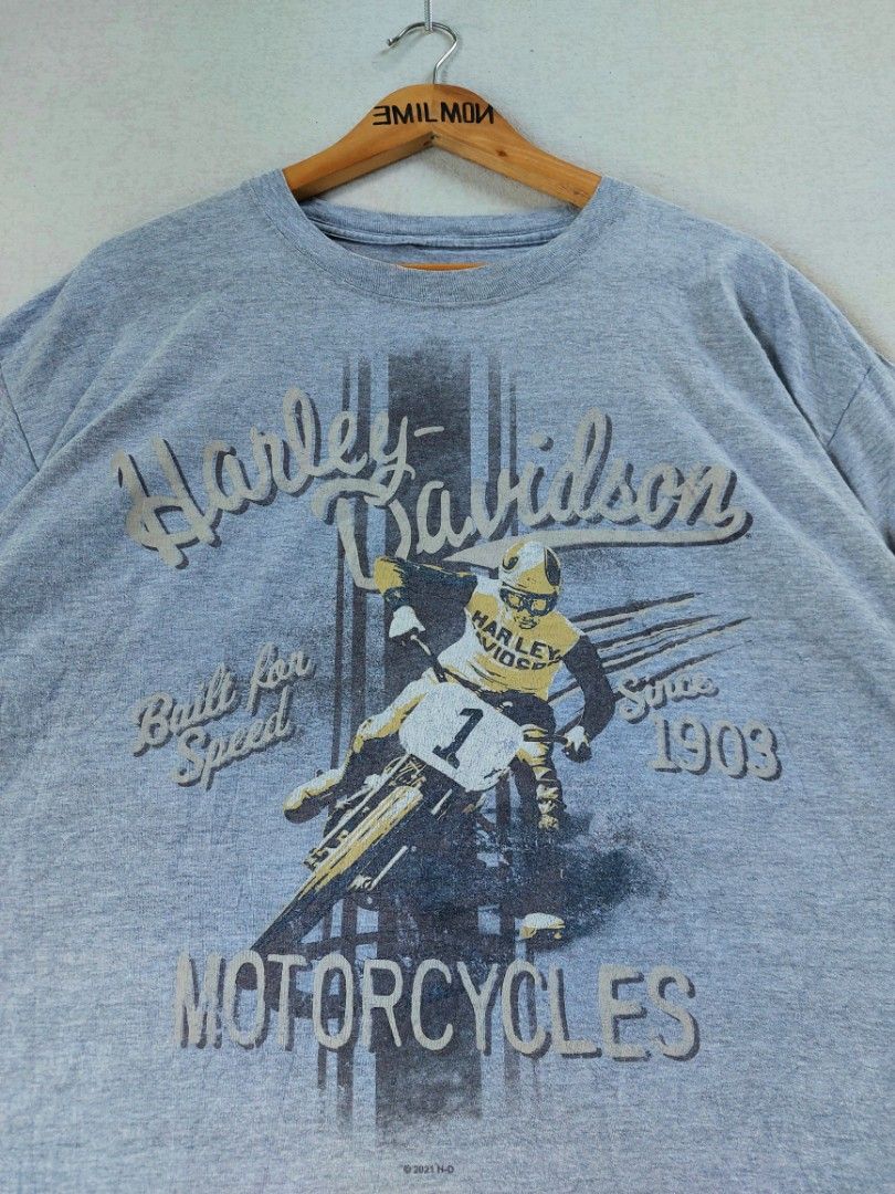 Harley-Davidson Motorcycles Graphic T-Shirt (Category: Tshirts & Polo Shirts ) located in Palayan City. Submitted by akhai420 (Listing ID 1464201317, Image 3). Description: - Grey Harley-Davidson t-shirt - Front graphic: 'Harley-Davidson Motorcycles Built for Speed Since 1903' - Back graphic: 'High Stakes Harley-Davidson' with poker chips and motorcycle design - Copyright 2021 H-D - Ideal for any Harley-Davidson enthusiast - Cut tag, loose stitch