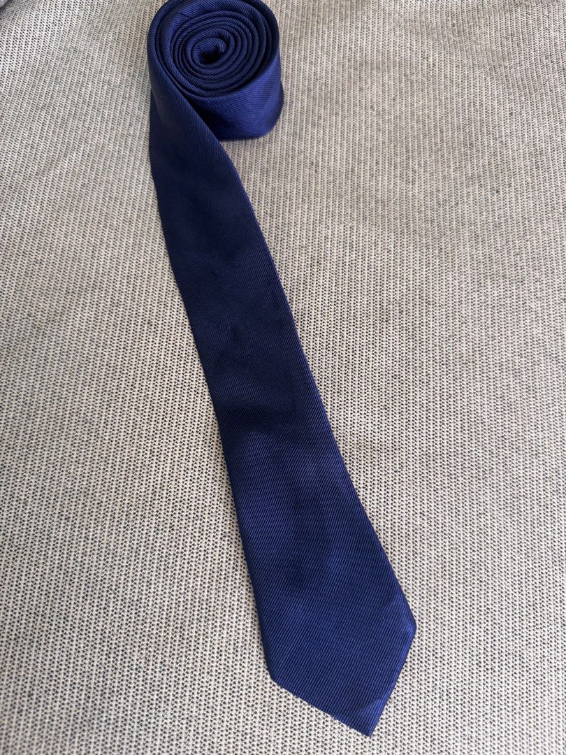 Hechter Paris Navy Blue Textured Tie (Category: Ties) located in Mandaluyong City. Submitted by cartmyitems (Listing ID 1464205230, Image 3). Description: - Classic navy blue tie from Hechter Paris - Features a subtle ribbed texture - Ideal for formal occasions or smartening up an outfit - Rolls up neatly for storage or travel - A versatile accessory for any wardrobe.