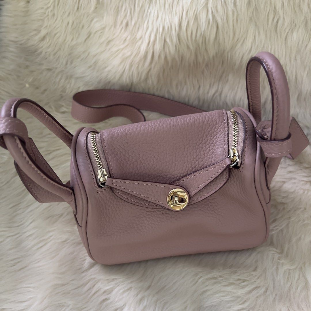 Hermes Lindy Mini Bag Dusty Rose (Category: Luxury Bags & Wallets) located in Mandaue City. Submitted by heeba_inu2 (Listing ID 1464167565, Image 2). Description: - NGA - slight discoloration on the bottom (slide 5) - spacious interior Price can be negotiated! Please feel free to DM for more info! 💕.