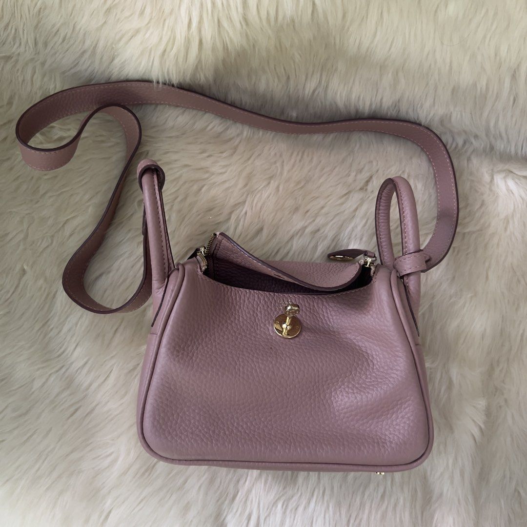 Hermes Lindy Mini Bag Dusty Rose (Category: Luxury Bags & Wallets) located in Mandaue City. Submitted by heeba_inu2 (Listing ID 1464167565, Image 1). Description: - NGA - slight discoloration on the bottom (slide 5) - spacious interior Price can be negotiated! Please feel free to DM for more info! 💕.