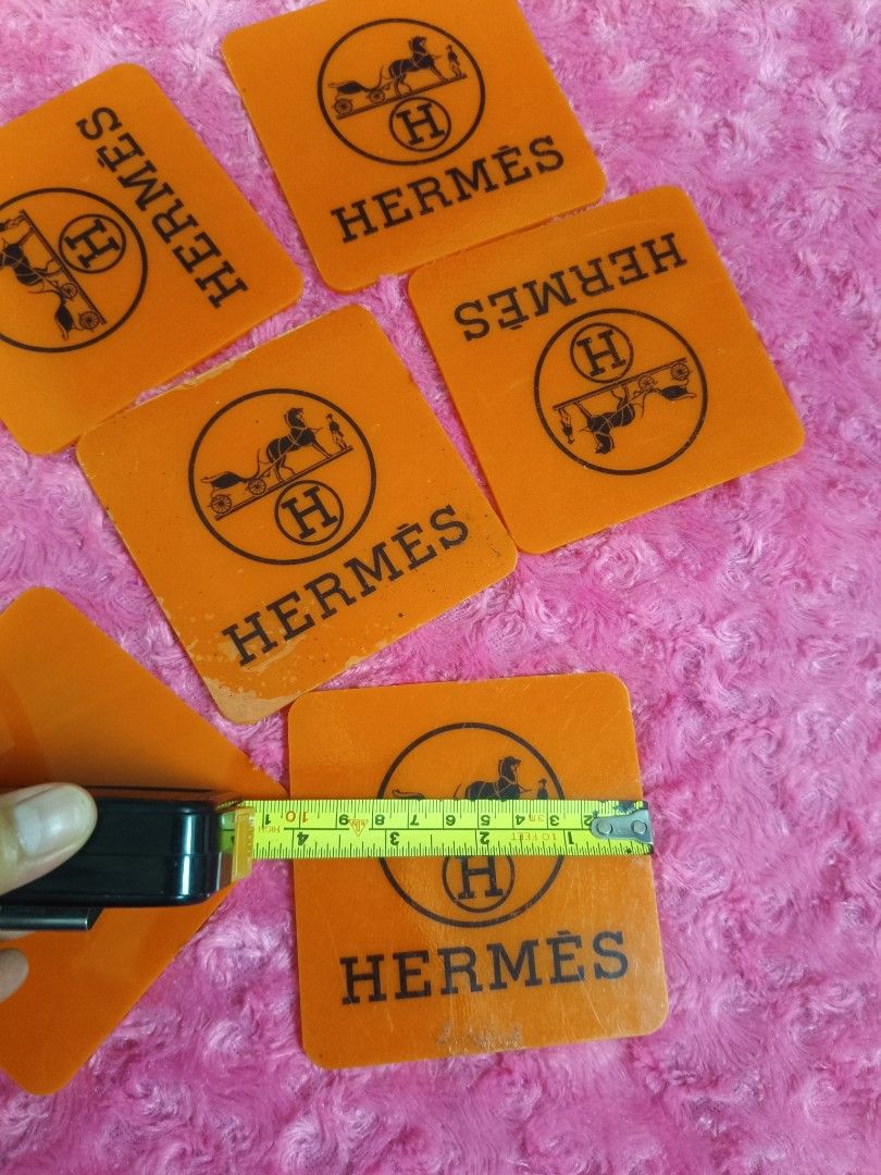 Hermes Orange Coasters Set (Category: Coffee & Tea Tableware) located in Pasay City. Submitted by ynamariie (Listing ID 1464246702, Image 3). Description: - Set of 6 Hermes coasters - Classic orange color with Hermes logo - Square shape, approx. 4x4 inches - Ideal for your home bar or as a thoughtful gift.