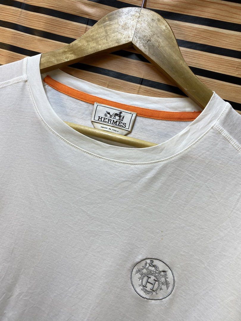 HERMES “SMALL LOGO” TEE (Category: Tshirts & Polo Shirts ) located in Makati City. Submitted by drip.poww (Listing ID 1464230860, Image 3). Description: - Authentic Hermes - Color: White - Size: Meduim - Dimes: 21x26 - Authentic - Excellent condition - Need wash, fresh from bale - Material: 100% Cotton Please don’t expect too much—these are thrifted (ukay) items. 😊 !!STILL NEGOTIABLE!!.