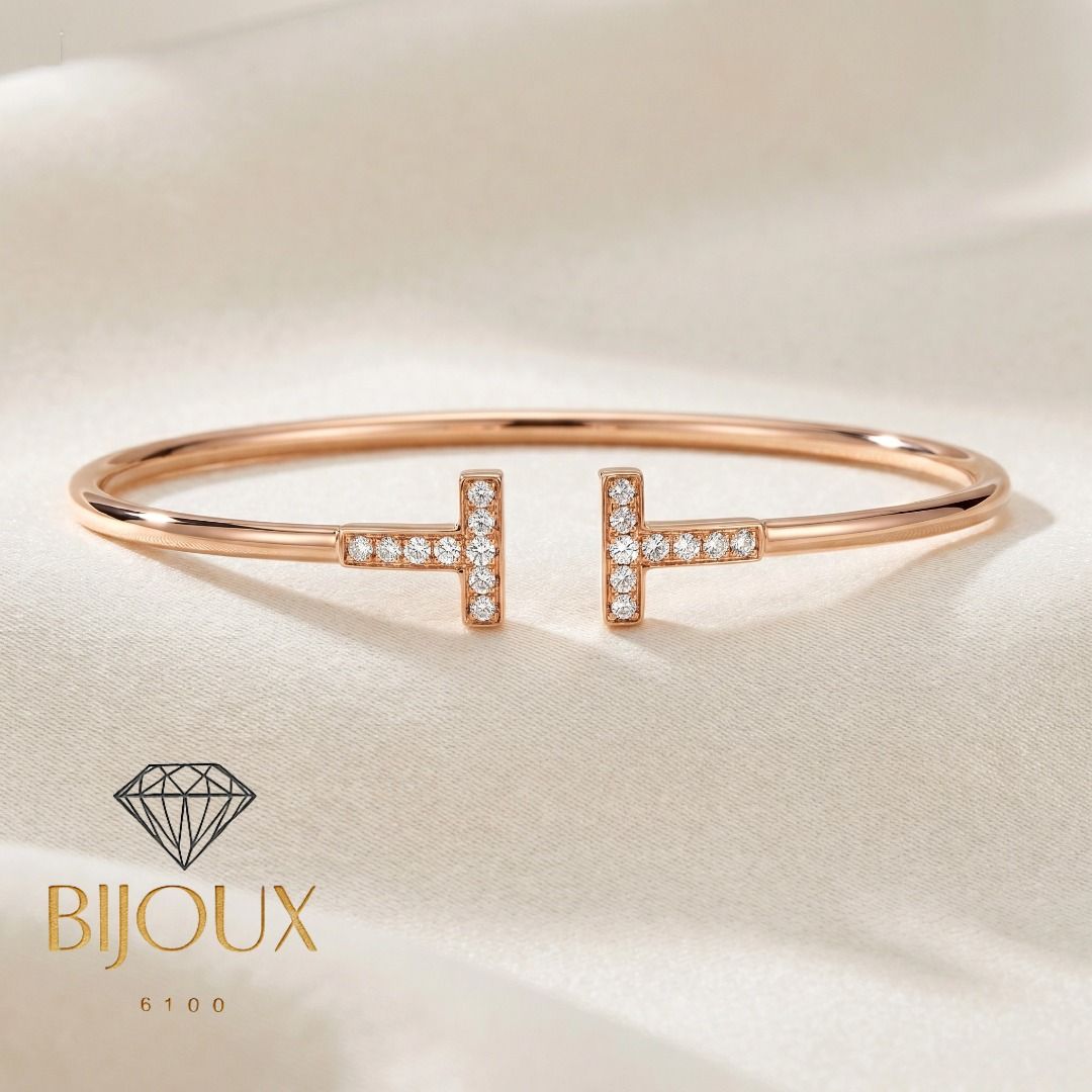 🔥SALE HK Settings 18K Gold T&Co Diamond T Bangle Pawnable (Category: Bracelets) located in Bacolod City. Submitted by bijoux6100 (Listing ID 1464284786, Image 1). Description: ℍ𝕂 𝕊𝕖𝕥𝕥𝕚𝕟𝕘𝕤 𝟙𝟠𝕂 𝔾𝕠𝕝𝕕 𝕋&ℂ𝕠 𝔻𝕚𝕒𝕞𝕠𝕟𝕕 𝕋 𝔹𝕒𝕟𝕘𝕝𝕖 ℙ𝕒𝕨𝕟𝕒𝕓𝕝𝕖 Diamond carat weight: .24ct Round, Brilliant and Natural Diamonds Weight: 6.18 grams Karat: 18K Rose Gold (HK Setting with markings and serial) Length: 19cm See video 📽 of item here