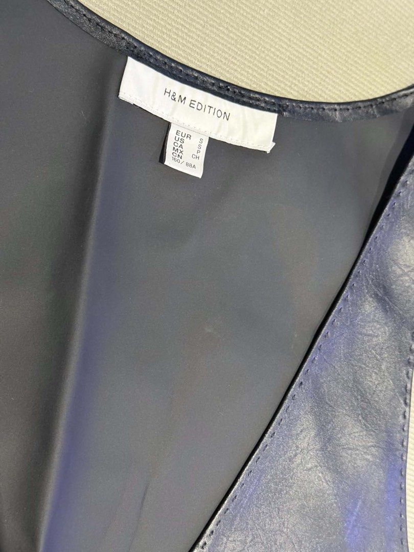 H&M Black Leatherette dress (Category: Dresses) located in Taguig. Submitted by annebydesign (Listing ID 1464277453, Image 3). Description: Hi all. Selling this H&M Leather sleeveless black dress for ₱300 •Like new. From an artist closet •Fits small to med •With softer inner lining- Loc: Taguig BGC Mop: GCash/ Bank transfer/ COD Mop: Courier/ Rider pick up.