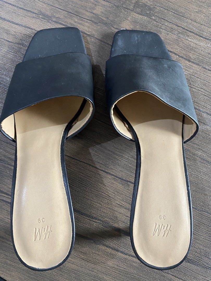 H&M Black Square Toe Heeled Mules Size 39 (Category: Heels) located in Quezon City. Submitted by jiujitsu_la (Listing ID 1464139796, Image 3). Description: - Brand: H&M - Color: Black - Style: Heeled Mules - Toe Shape: Square - Closure: Slip-on - Heel Height: Moderate - Size: 39 - Versatility: Perfect for dressing up or down.