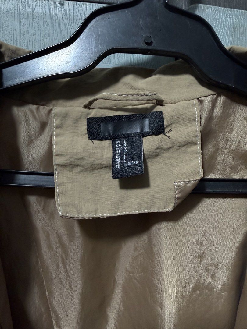 Forever 21 Cropped Bomber Jacket Khaki Size L (Category: Coats, Jackets and Outerwear) located in Manila. Submitted by aprilled (Listing ID 1464255303, Image 3). Description: - Khaki Cropped Bomber Jacket - Features a high collar - Elasticated cuffs and hem for a snug fit - Two large front pockets with button closure - Zip-up front - Ideal for layering - Pairs well with jeans or leggings.