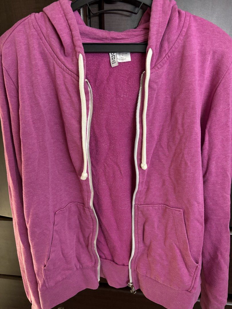 H&M Divided Basic Pink Zip-Up Hoodie (Category: Coats, Jackets and Outerwear) located in Mandaluyong City. Submitted by peachy.cloud (Listing ID 1464210321, Image 1). Description: - H&M Divided Basic pink zip-up hoodie - Size: Medium (M) - Features: Drawstring hood, front pockets - Ideal for: Casual wear You can still see the plastic where the tag was, unused but was left sitting inside the cabinet- has lints that is why selling it for low price.