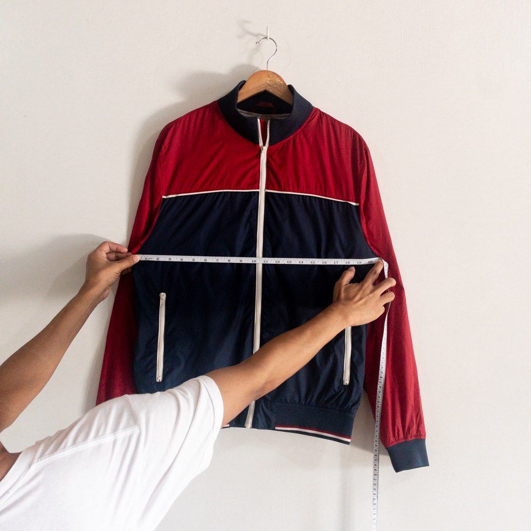 H&M LOGG Track Jacket Red Navy Blue Size M (Category: Coats, Jackets and Outerwear) located in Lipa City. Submitted by xd6826 (Listing ID 1464146575, Image 3). Description: - Classic H&M LOGG track jacket - Red and navy blue color block design - Full zip front with white accents - Ribbed cuffs and hem - Two zip pockets on the front - Perfect for casual wear or light sports.
