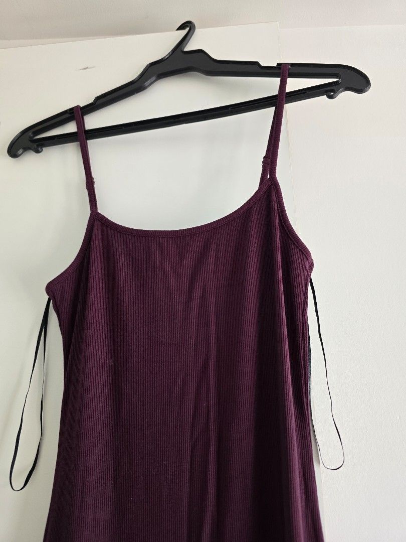 H&M Ribbed Plum Maxi Dress (Category: Dresses) located in Paranaque City. Submitted by incognitopawikan (Listing ID 1464161374, Image 2). Description: - Plum colored ribbed maxi dress - From Divided by H&M - Features spaghetti straps with adjustable length - Made with stretchy material for comfort - Versatile for layering or wearing solo.