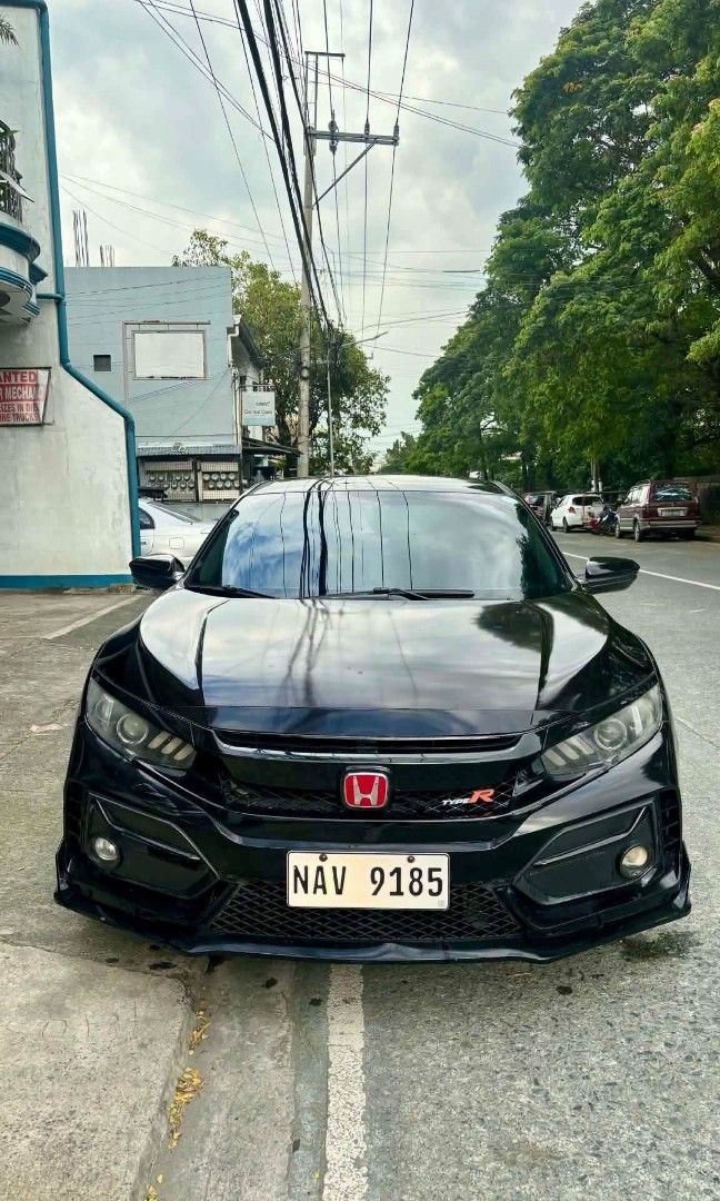 Honda Civic Type R Auto (Category: Used Cars) located in Pasay City. Submitted by bossoma33 (Listing ID 1464298129, Image 1). Description: 🚗 FOR SALE: HONDA CIVIC TYPE R 🚗 🔹 Plate No.: NAV 9185 🔹 Color: Glossy Black ✅ VEHICLE DETAILS - Make/Model: Honda Civic Type R (Hatchback) - Exterior: Full Type R Body Kit, Front Lip, Side Skirts, Rear Spoiler - Paint: Gloss Black — well-maintained, clean & shiny - Wheels: Black Alloy Rims - Windows: Tint