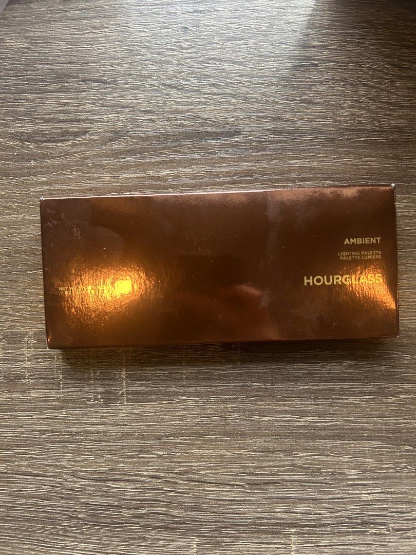 Hourglass Ambient Lighting Palette Lumiere (Category: Makeup) located in Manila. Submitted by gabbiescloset (Listing ID 1464160848, Image 2). Description: - Hourglass Ambient Lighting Palette - Includes three shades: Dim Light, Incandescent Light, and Radiant Light - Perfect for achieving a subtle, luminous glow - Comes with original packaging and instructions - BRAND NEW UNUSED RF: I have too much makeup.