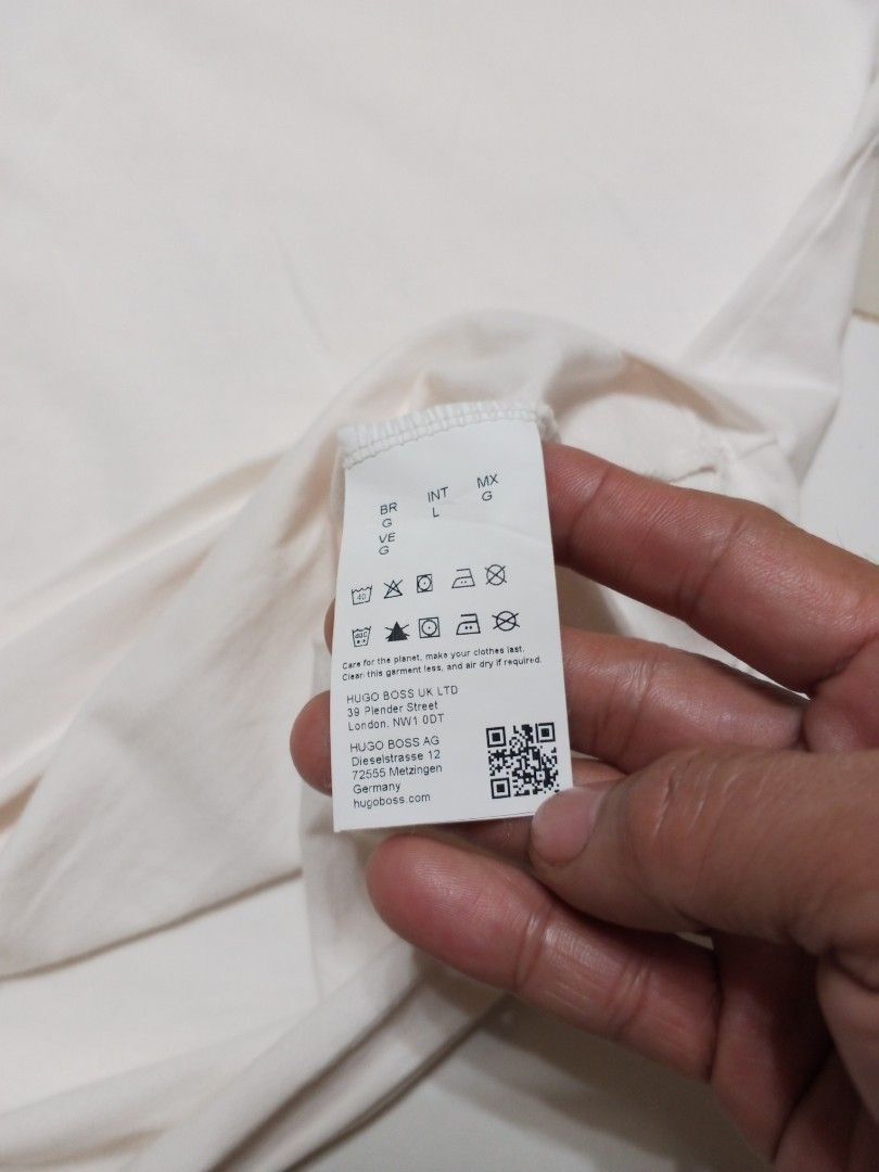 Hugo boss (Category: Tshirts & Polo Shirts ) located in Davao. Submitted by redickace1984 (Listing ID 1464293409, Image 3). Description: as new size large dimes 20x27 color rate 10 no issues.
