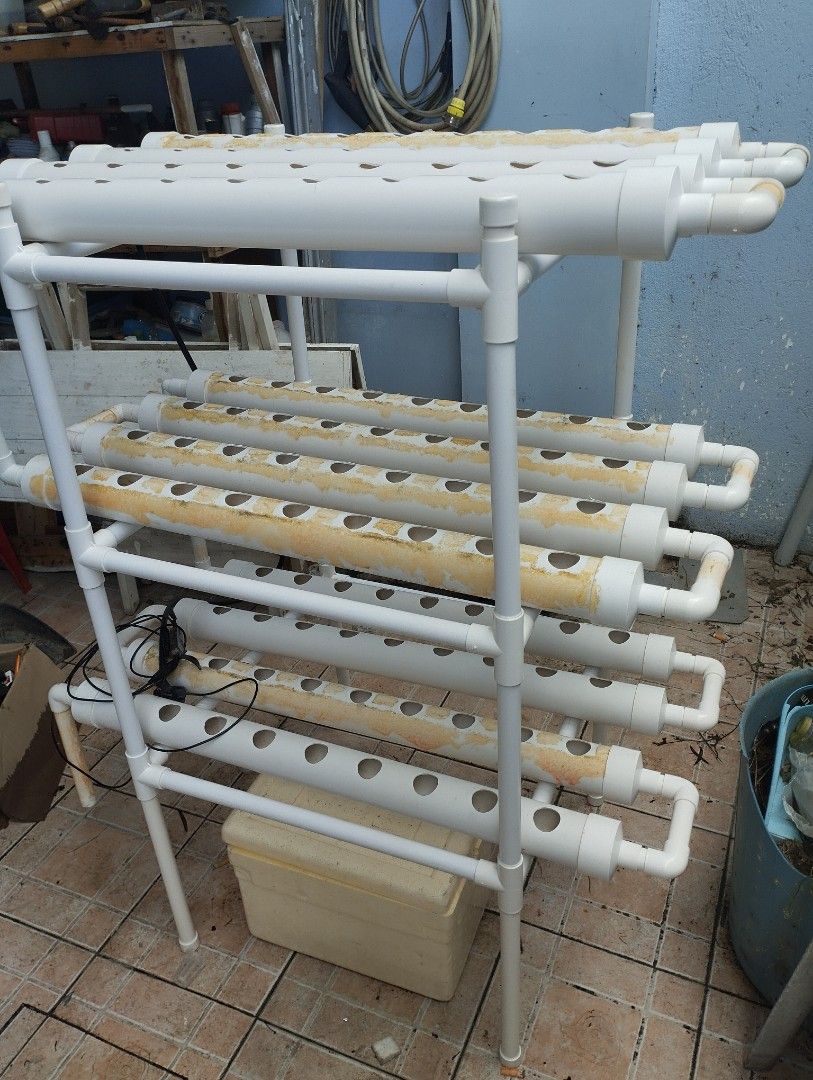 Hydroponics NFT system 108 holes (Category: Pots & Planters) located in Batangas. Submitted by yuriline_shop (Listing ID 1464176416, Image 3). Description: Hydrophonics NFT 108 Holes. With water pump (working) and additional water storage. No plastic cups. Plastics cups (45mm x 45mm) are available in other online platform like S. for around P200 (100pcs)..